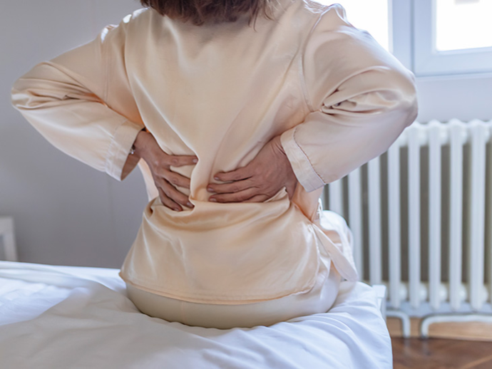 Here’s Why You Get Lower Back Pain During Your Period - And How to Reduce It